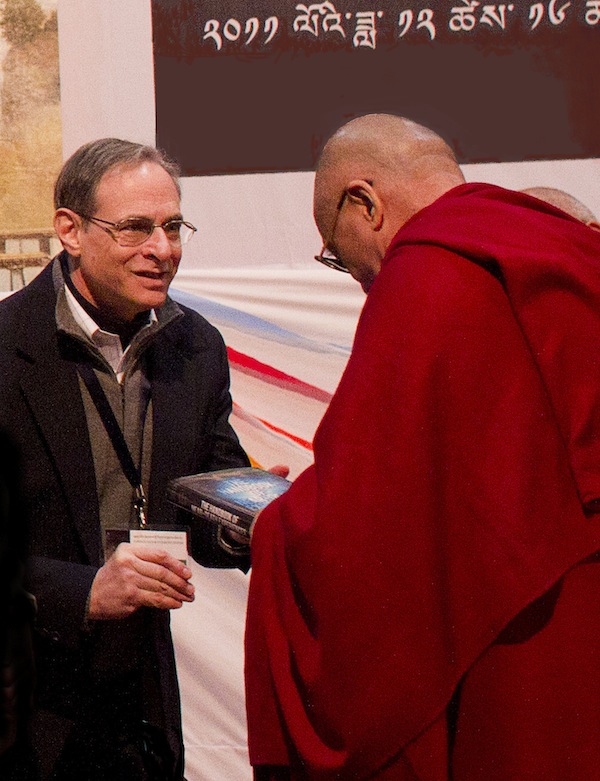 Bruce Greyson presents book to Dalai Lama