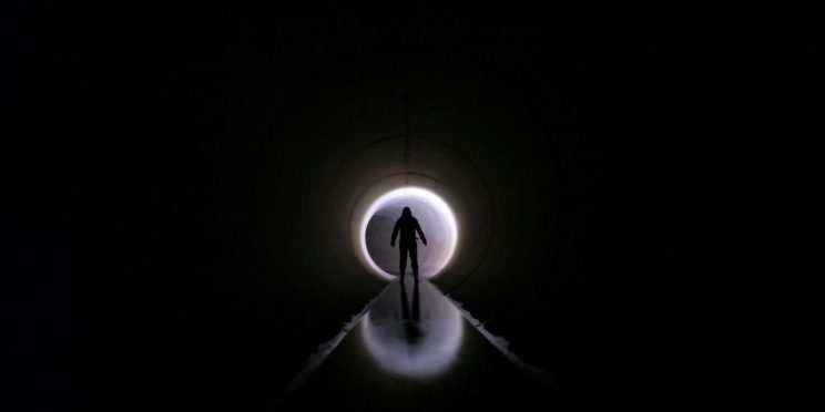 What is an atheist near-death experience like and how does an nde challenge their views?