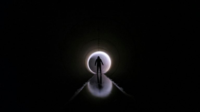 What is an atheist near-death experience like and how does an NDE challenge their views?